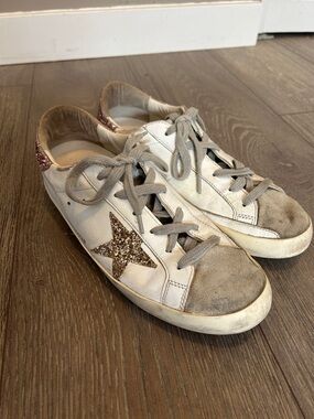 Super-Star Golden Goose sneakers with suede star and peach-pink heel tab